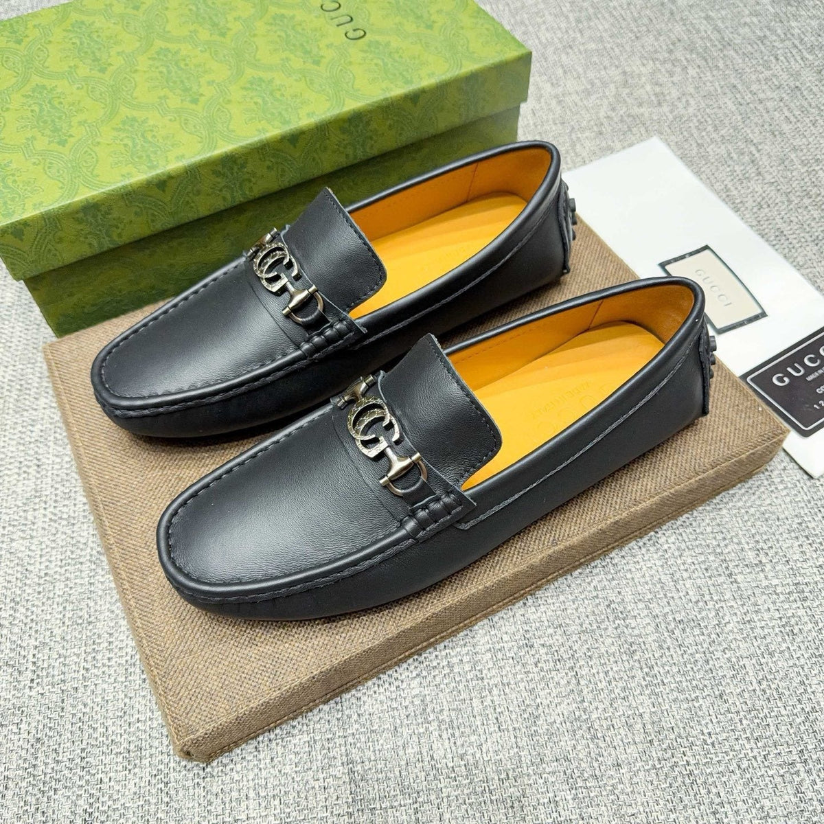GUCCI Black Metal-Detail Loafers