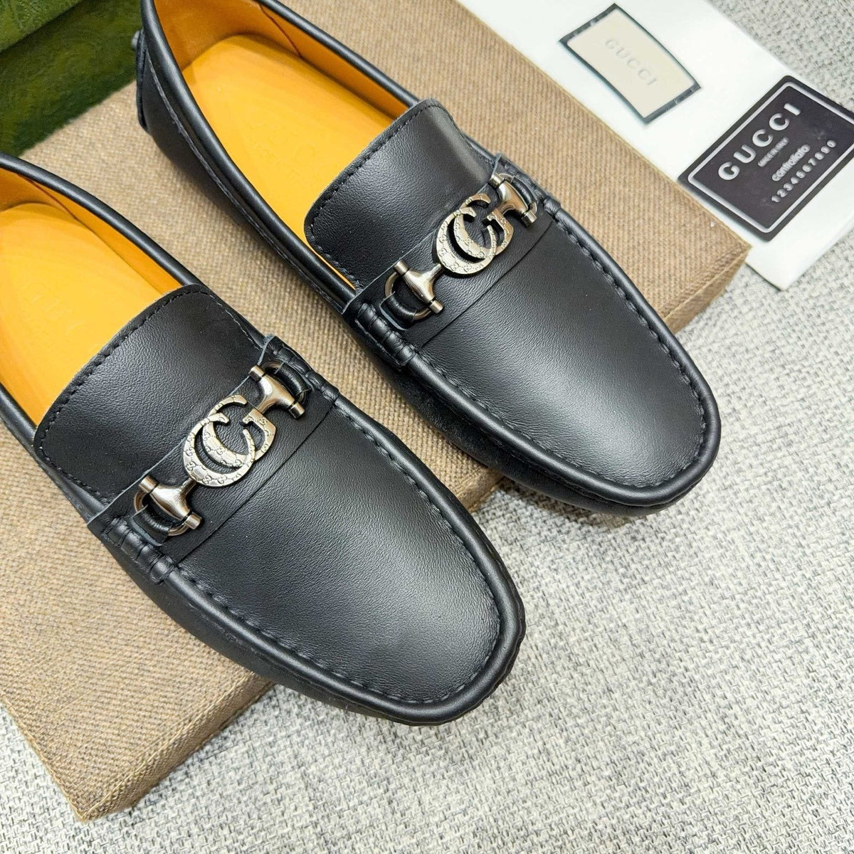 GUCCI Black Metal-Detail Loafers